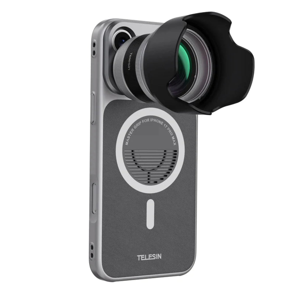 The magnetic lens attachment with hood and lens, mounted on the phone case