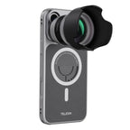 The magnetic lens attachment with hood and lens, mounted on the phone case