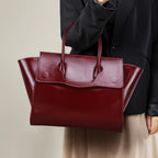 Full grain leather laptop tote in wine red, front view