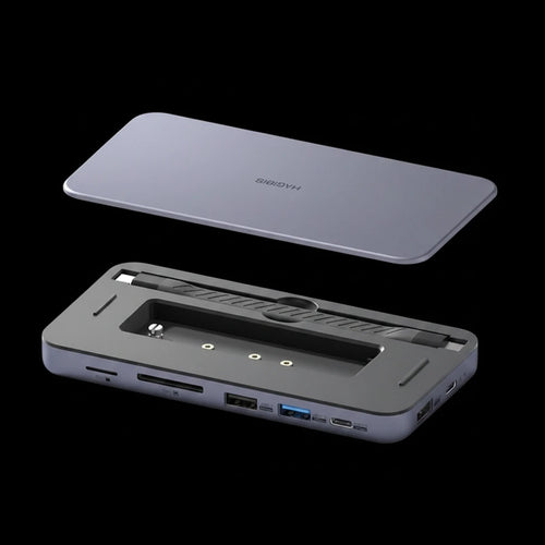 Gray electronic device with multiple ports on a light blue background