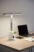Bladeless tower fan in white and silver, showing the circular base, vertical column and horizontal air-outlet arm