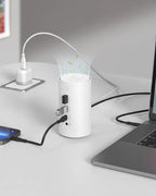 The docking station on a desk beside other devices, illustrating the negative ion air refresh