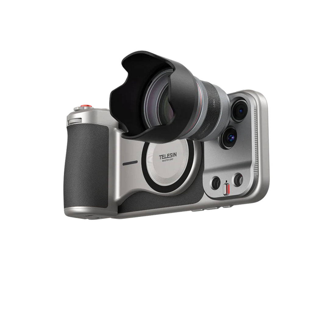 The camera grip in silver and black with the lens and hood fitted, shown three-quarter on