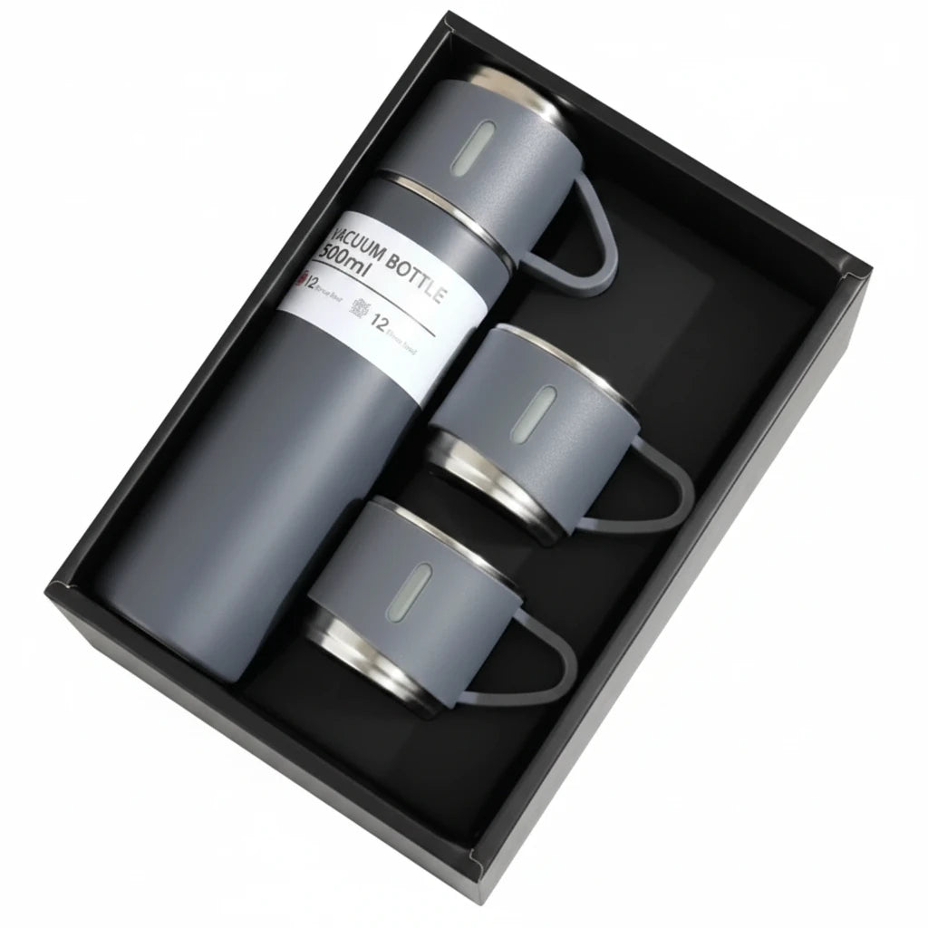 The flask and cups in their gift box, in the grey colourway