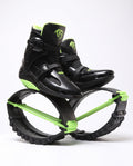 Black and green kangaroo bounce jump shoes, spring loaded fitness boots, studio side view