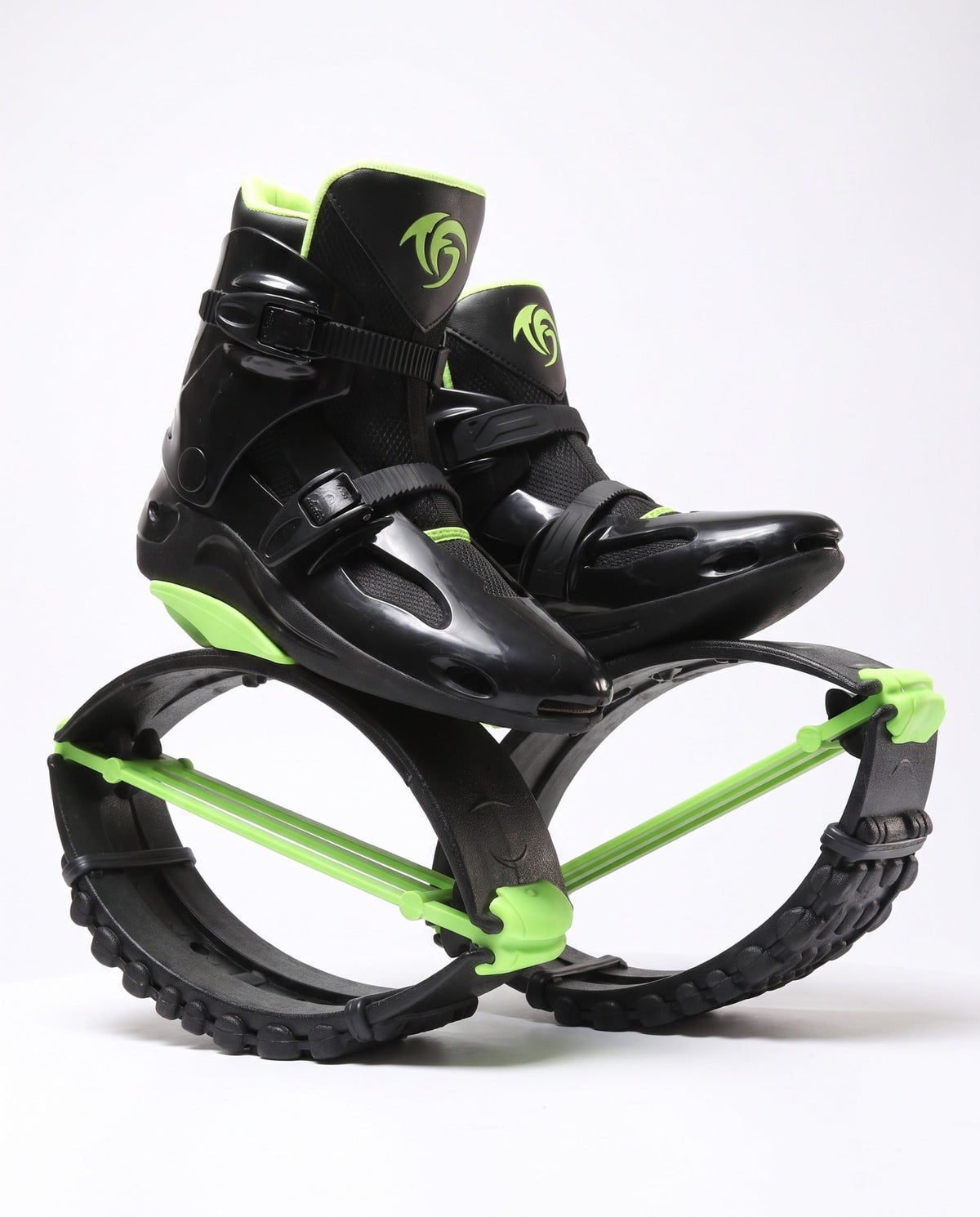 Black and green kangaroo bounce jump shoes, spring loaded fitness boots, studio side view