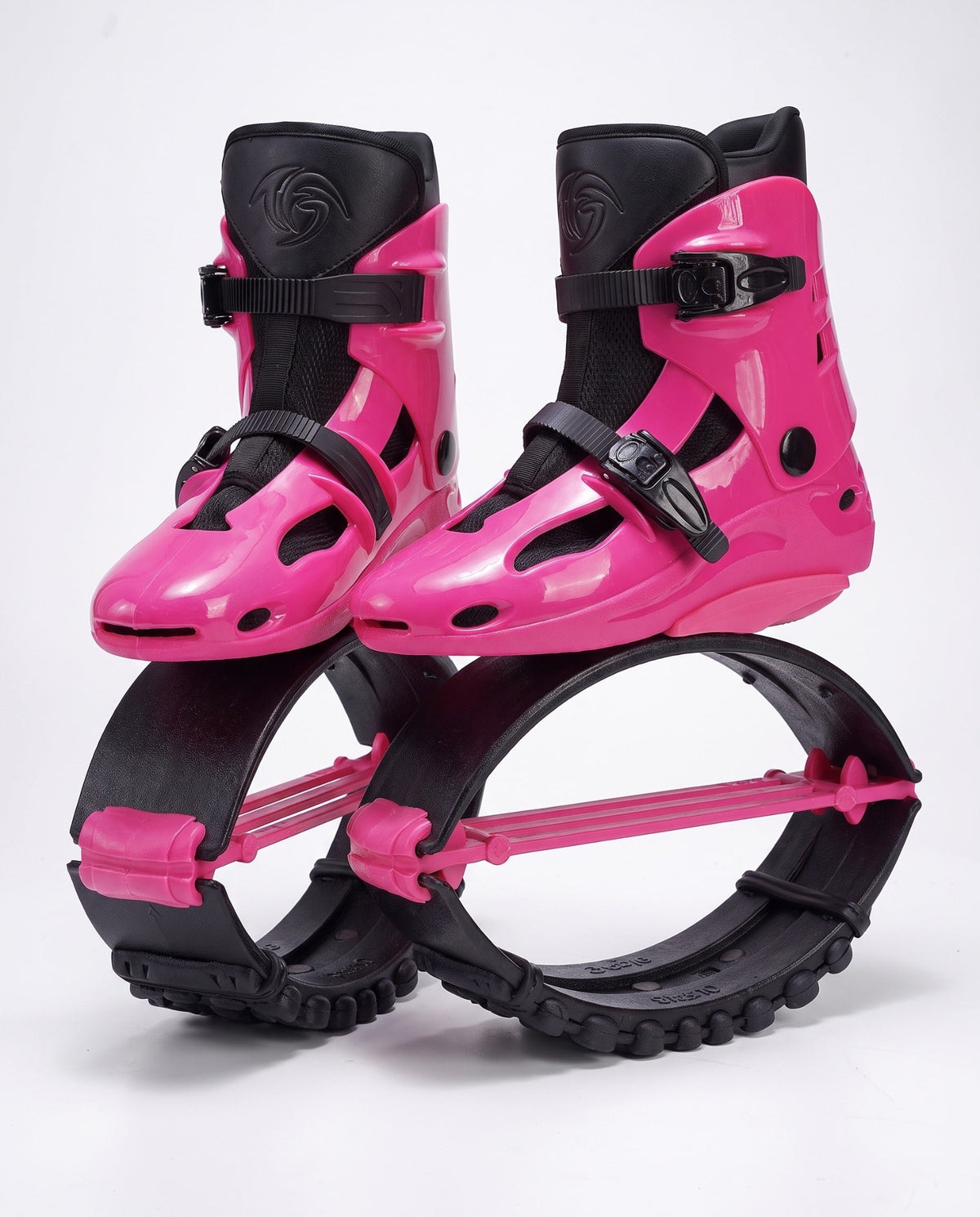 Hot pink and black kangaroo bounce jump shoes, spring loaded fitness boots, studio side view