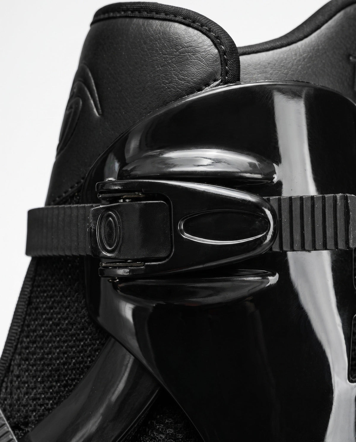 Close up of the multi point cam buckle closure on a black bounce jump shoe