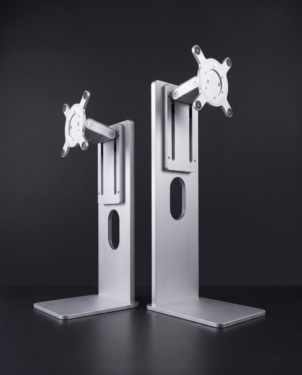 Aluminium monitor stand in 24 to 27 inch and 32 to 40 inch sizes side by side