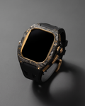 Carbon fibre and titanium case kit for Apple Watch Ultra 49mm in Black, gold plated bezel and crown on a black fluororubber strap