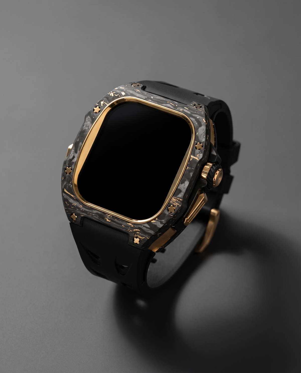 Carbon fibre and titanium case kit for Apple Watch Ultra 49mm in Black, gold plated bezel and crown on a black fluororubber strap