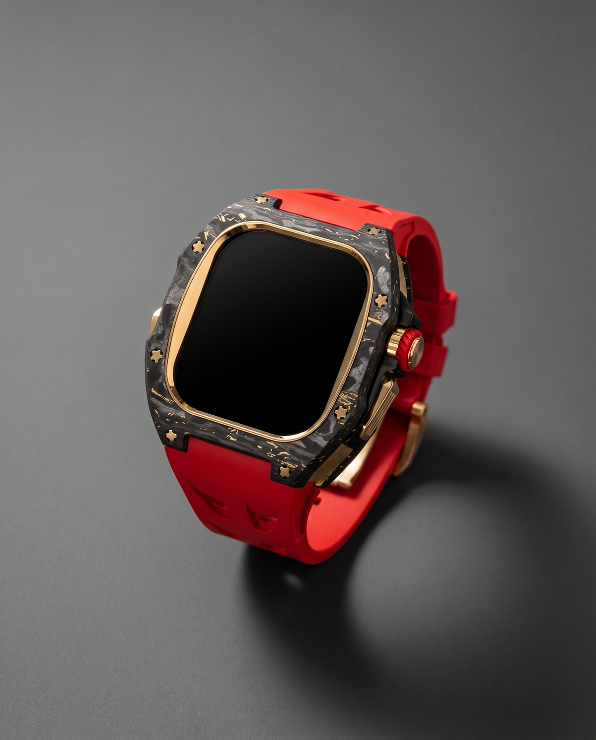 Carbon fibre and titanium case kit in Red, gold plated bezel with a red crown accent on a red fluororubber strap