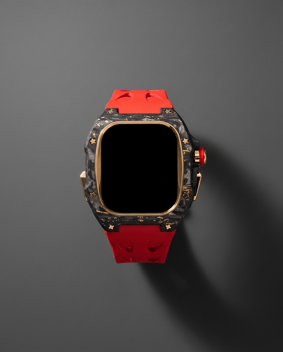 Front view of the case kit in Red showing the forged carbon fibre and the six point gold star screws