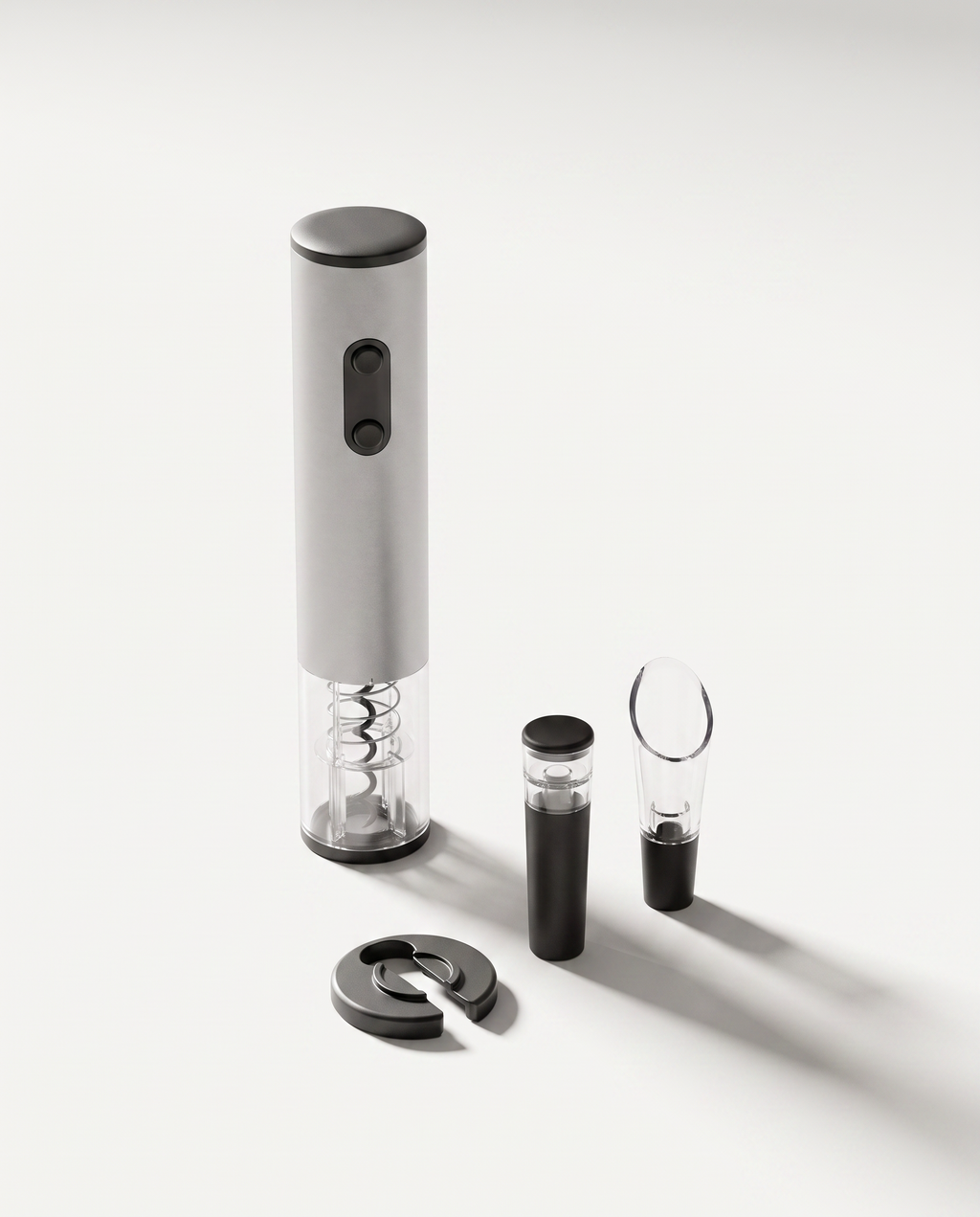 Four-piece electric wine opener gift set in light grey — corkscrew, foil cutter, vacuum stopper and aerator pourer on a soft white studio background