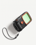 Black underwater phone housing with an orange-framed port and braided safety strap, shown against soft white.