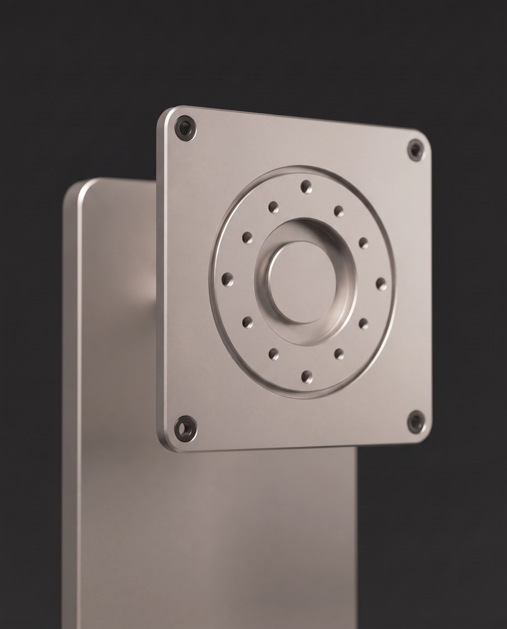 Close view of the VESA mounting plate and its circular rotation hub, with the four corner mounting holes.