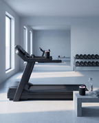 Two split speaker halves either side of a treadmill in a bright home gym