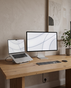 Kuycon G32P 6K monitor on a desk in a minimalist home studio
