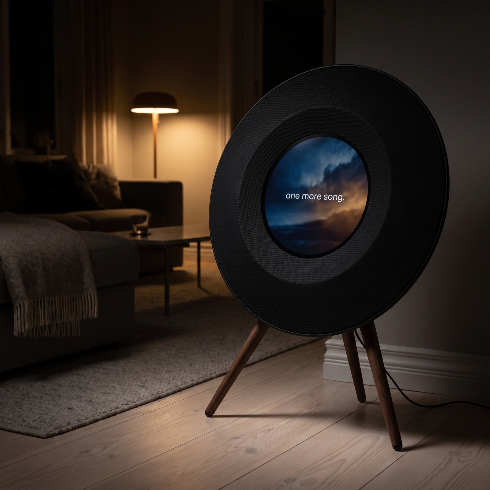 The black Floating Lyrics Grand lighting a darkened living room at night, its display the only bright thing in the room