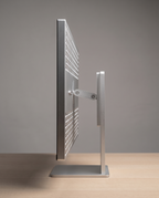 Side profile of the Kuycon P27Z showing the slim panel and the height adjustable aluminium stand