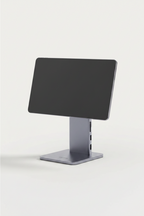 The magnetic aluminium iPad stand holding a tablet, seen from the front
